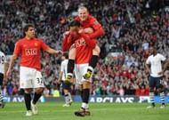 Rooney and Berbatov celebrate the final goal against Spurs